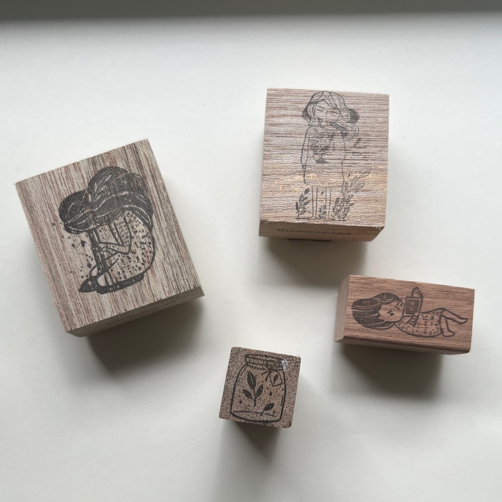 Four Black Milk Project Rubber Stamps